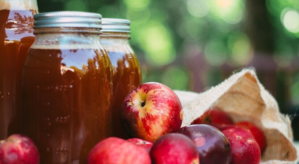 cider in jars and apples