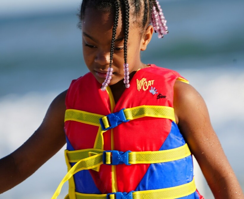 girl wearing a life vest
