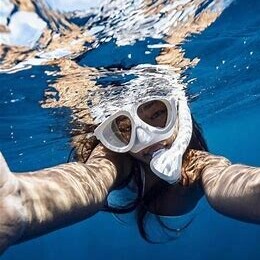 underwater swimmer with goggles